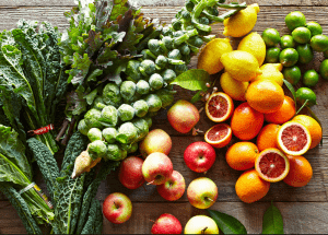 a group of fruits and vegetables on a wood surface Healthy Weight Loss Diets Willenhall